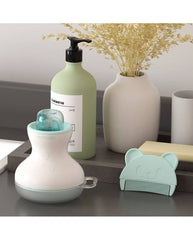 Momcozy kūdikio galvos plovimo rinkinys su talpa šampūnui ir putų pompa